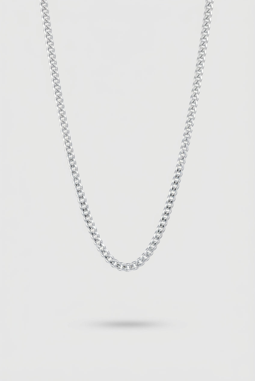 Cuban Chain Necklace in Silver on a Light Gray Background