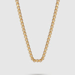 Grid Chain Necklace in gold on a light gray background