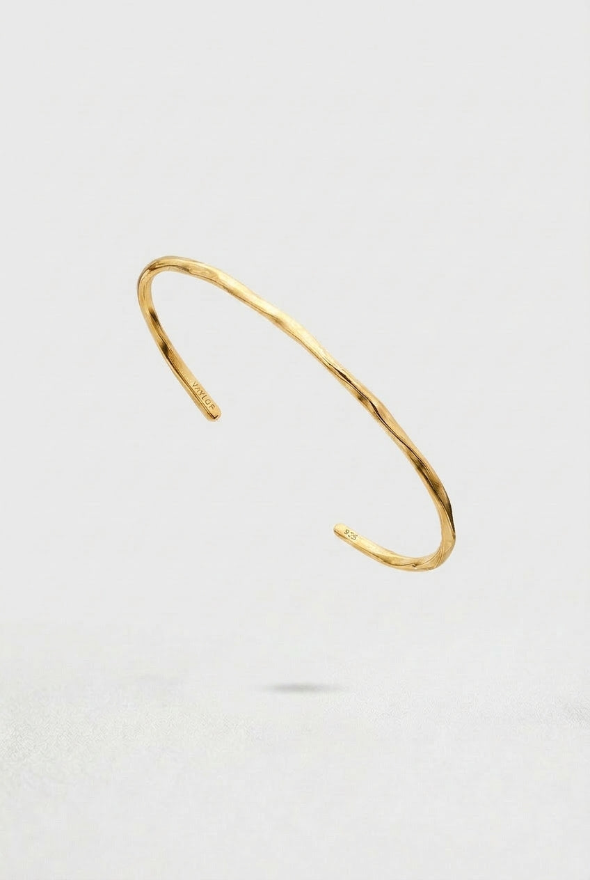 Gold Cuff Bracelet on a white background