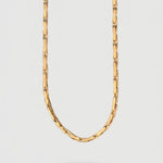 Gold Chain on a light gray background
