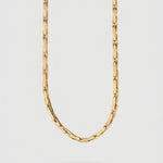 Gold Chain on a light gray background
